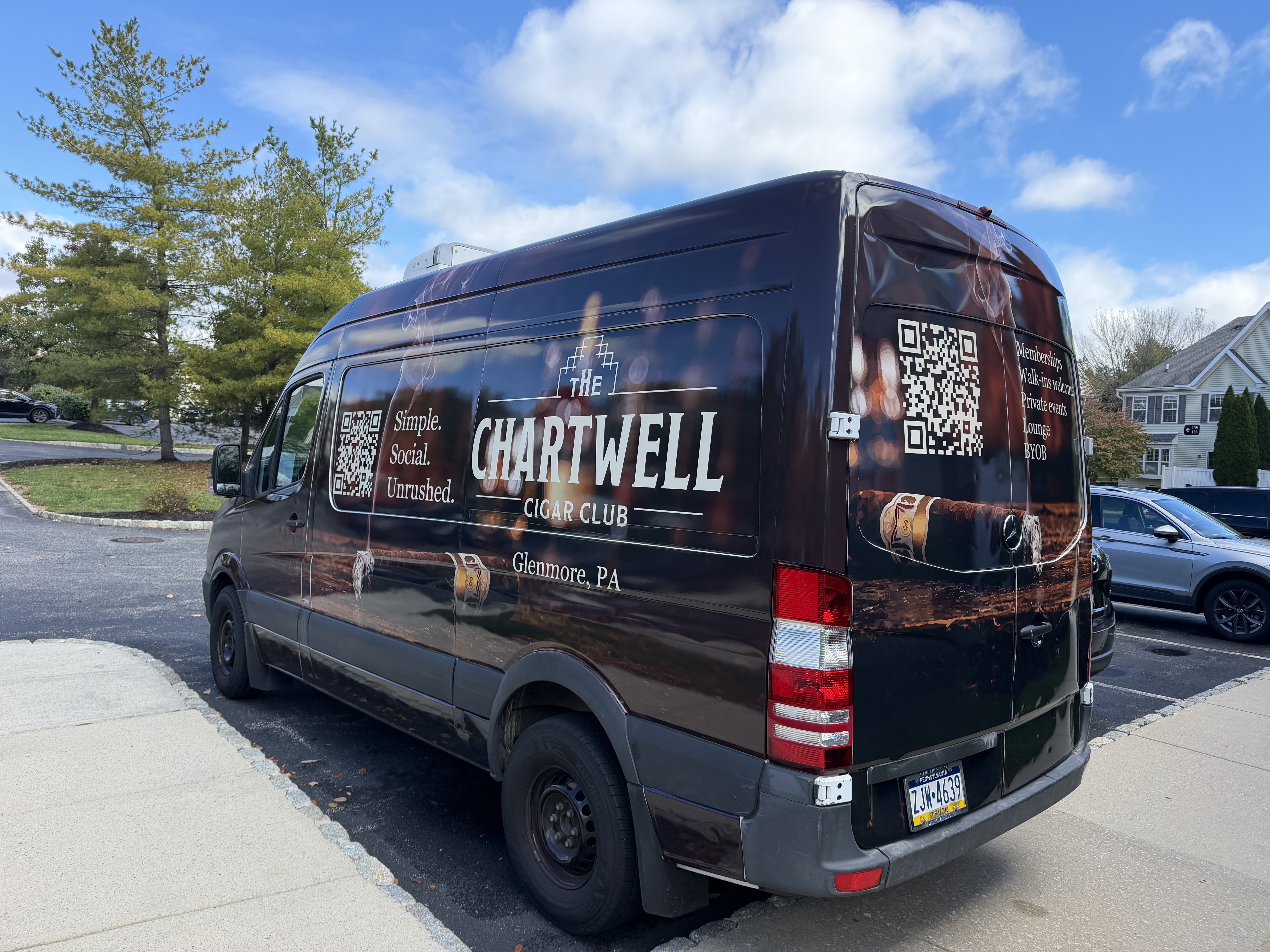 Rear doors of the Chartwell truck, listing memberships, walk-ins, private events, lounge and BYOB